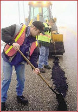 DPW Filling Potholes